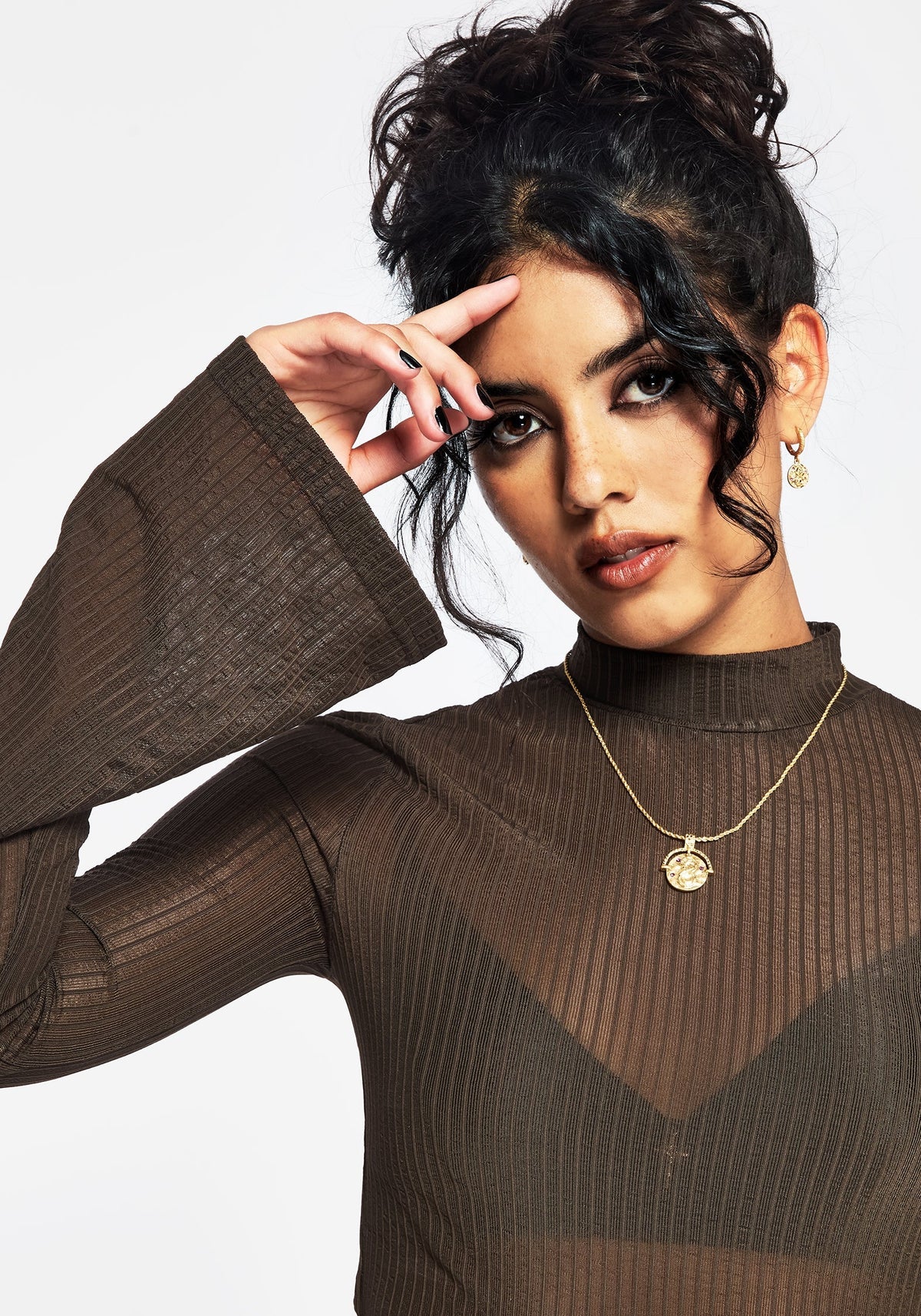 Top de manga acampanada de malla Yasmin